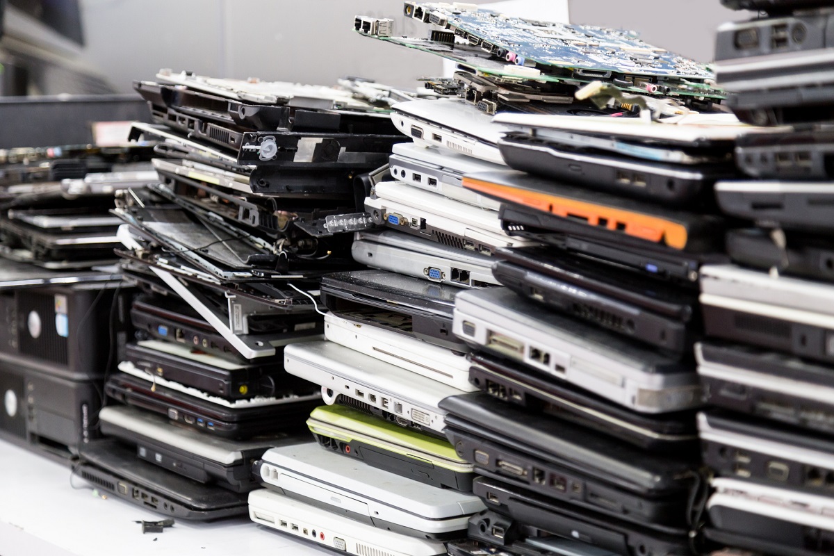 Stack of old, broken and obsolete laptop computer for repair